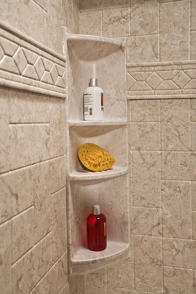 Four-shelf corner caddy in brecchia windmill walls with listello trim