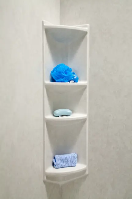 Four-shelf rectangular corner caddy in smooth white walls