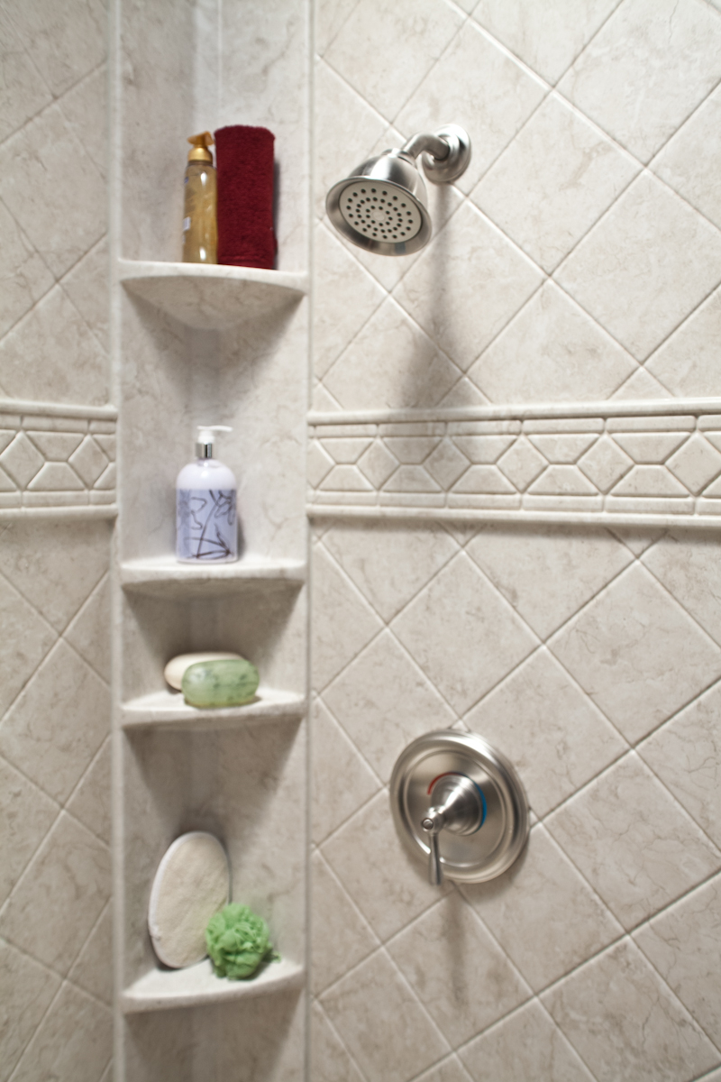 Tower caddy with diamond tile and listello trim in brushed nickel
