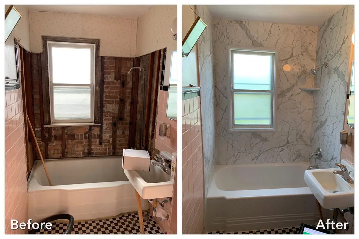 Demolished pink tile with exposed brick rebuilt to marble tub surround — before and after