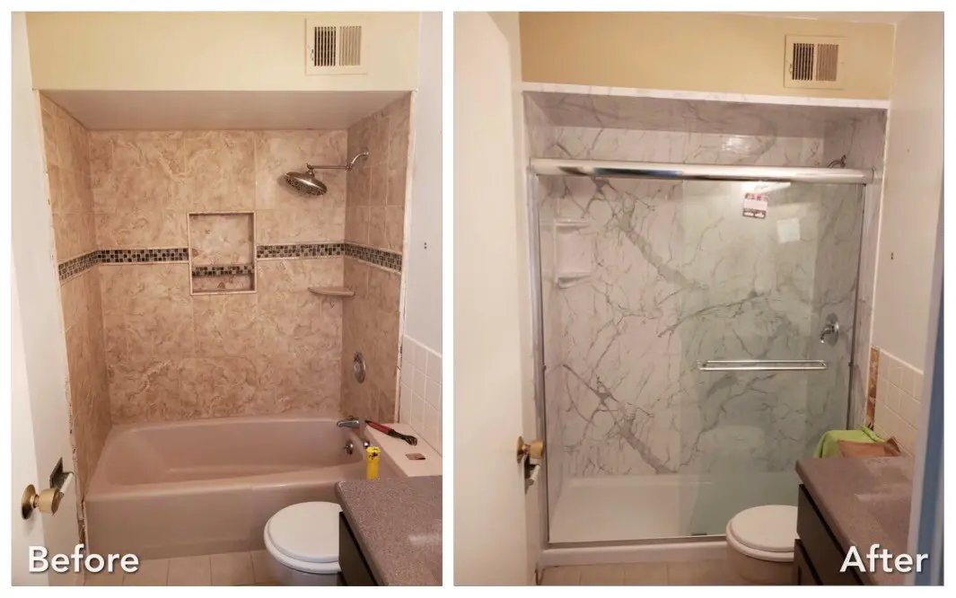 Beige tub converted to marble walk-in shower with glass doors — before and after